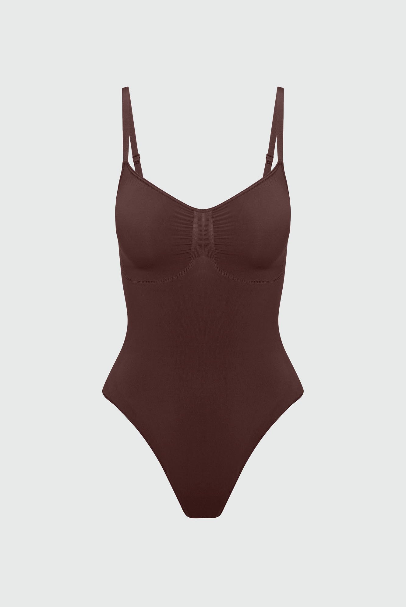 Brown bodyshaper on a light gray background