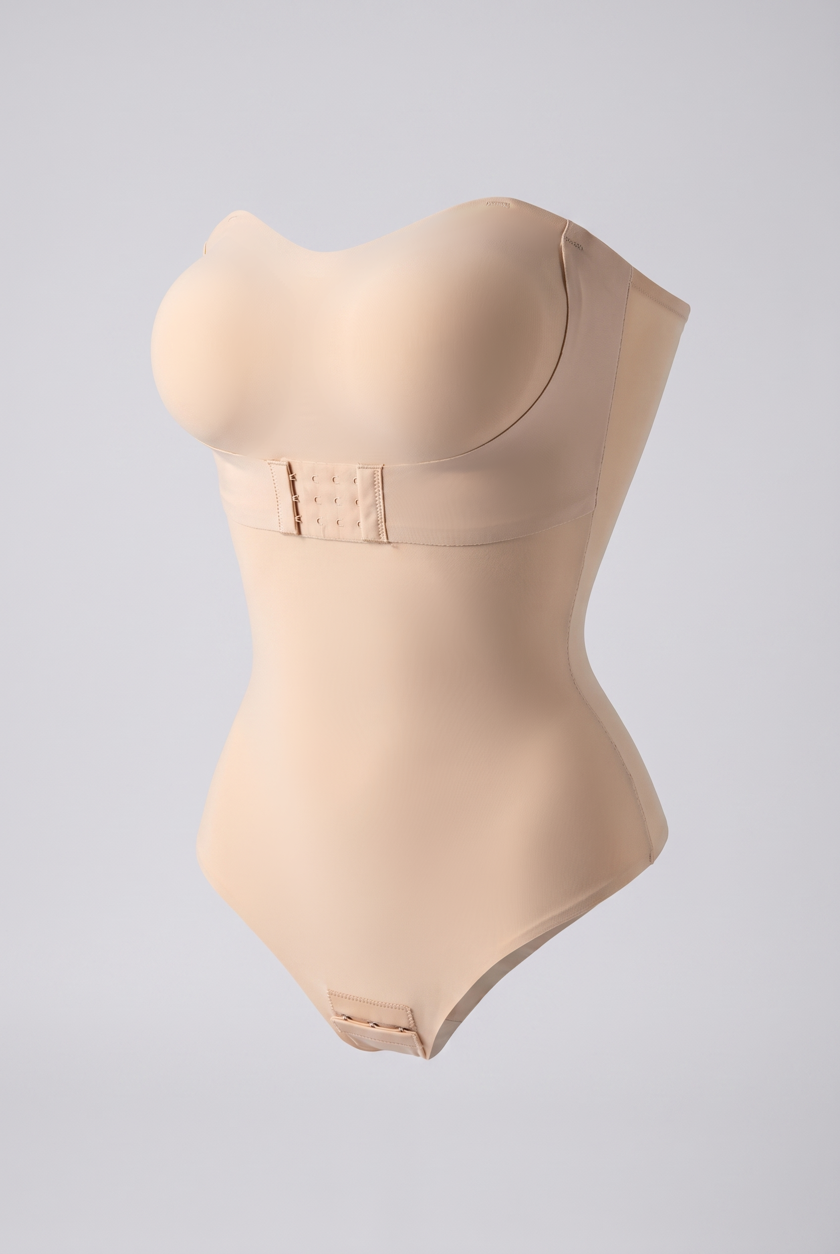Beige shapewear bodysuit on a light gray background