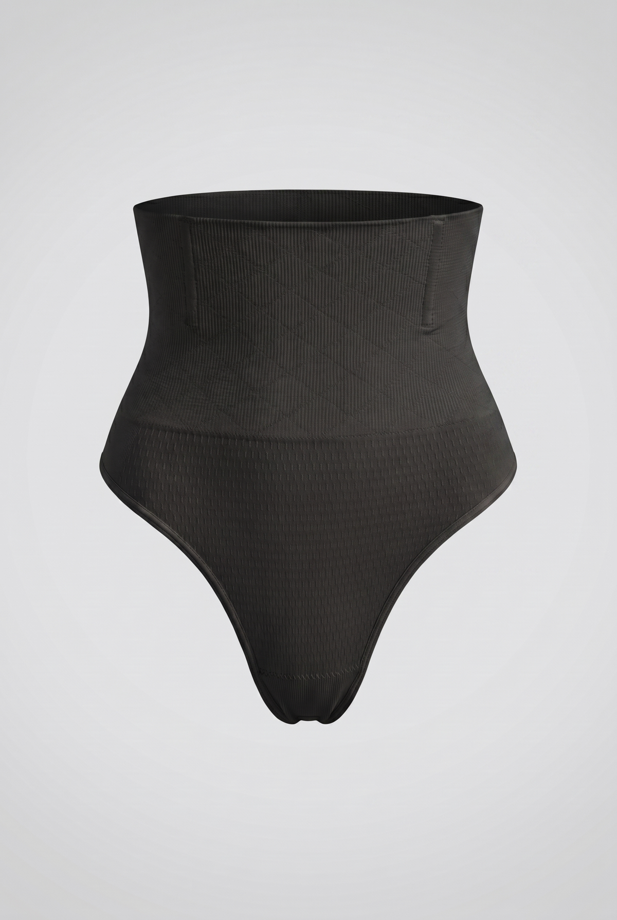 Black high-waisted shapewear on a light gray background