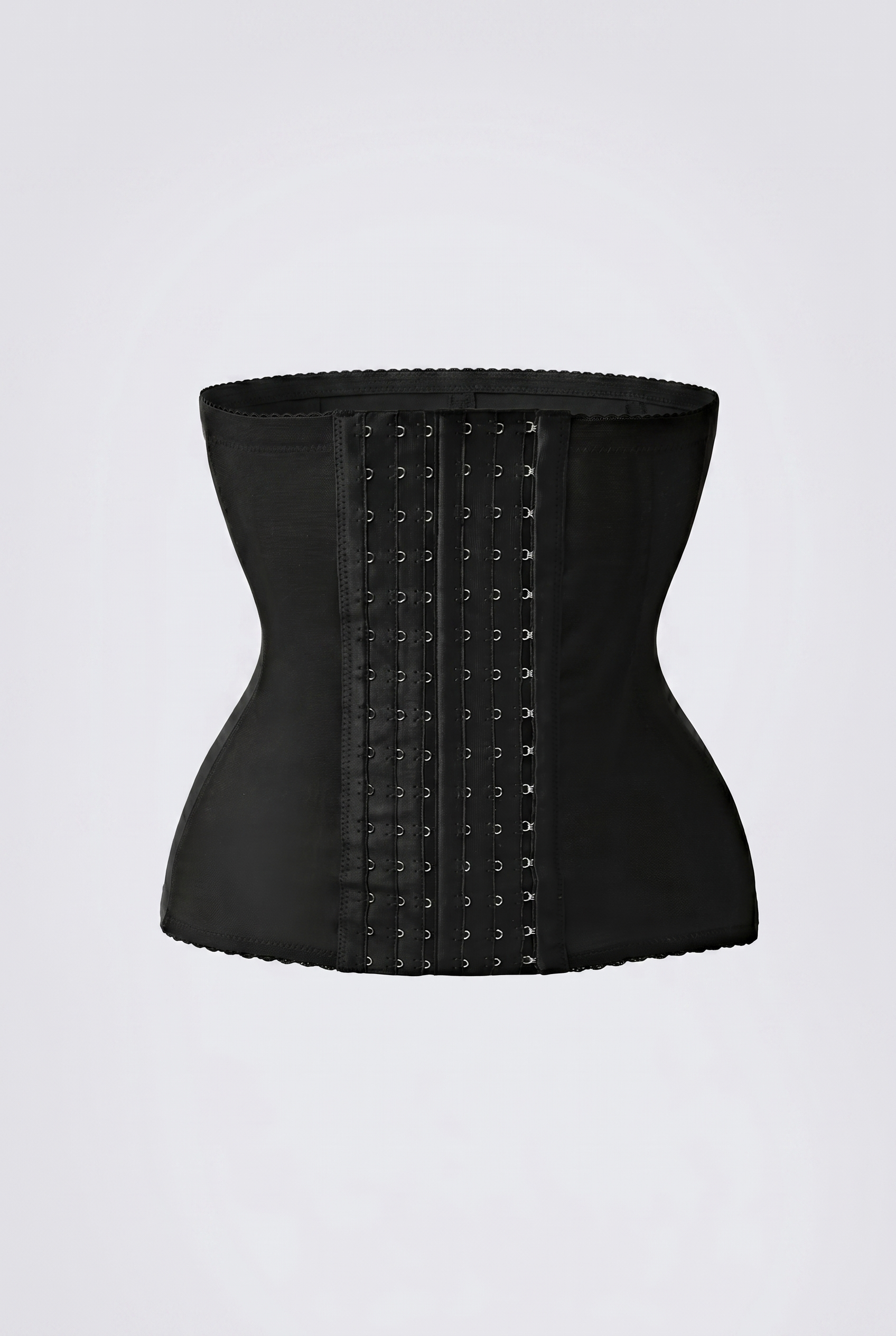Black waist trainer with decorative elements on a light gray background