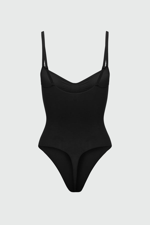 Black bodyshaper with thin straps on a light gray background