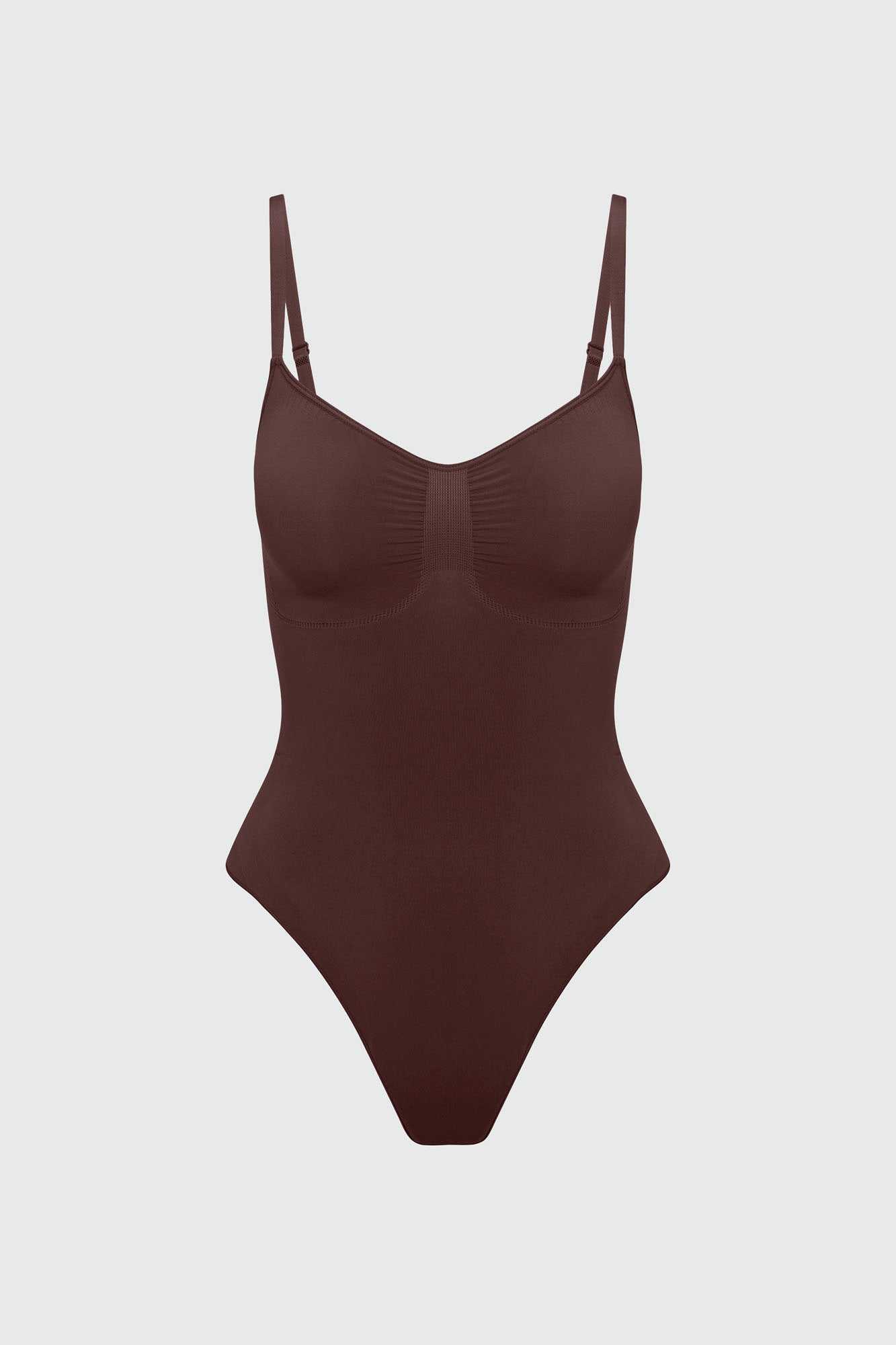Brown bodyshaper on a light gray background
