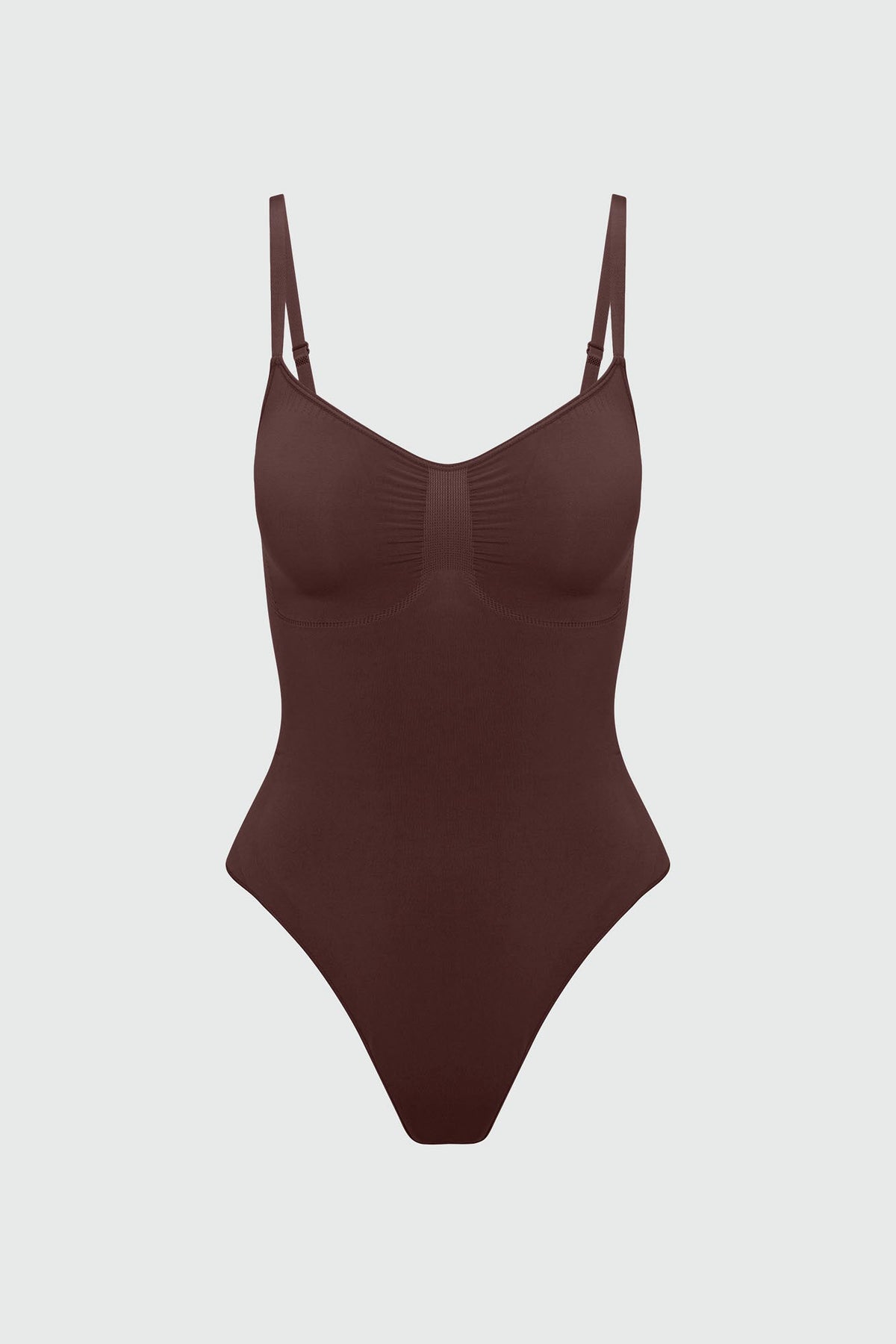 Brown bodyshaper on a light gray background