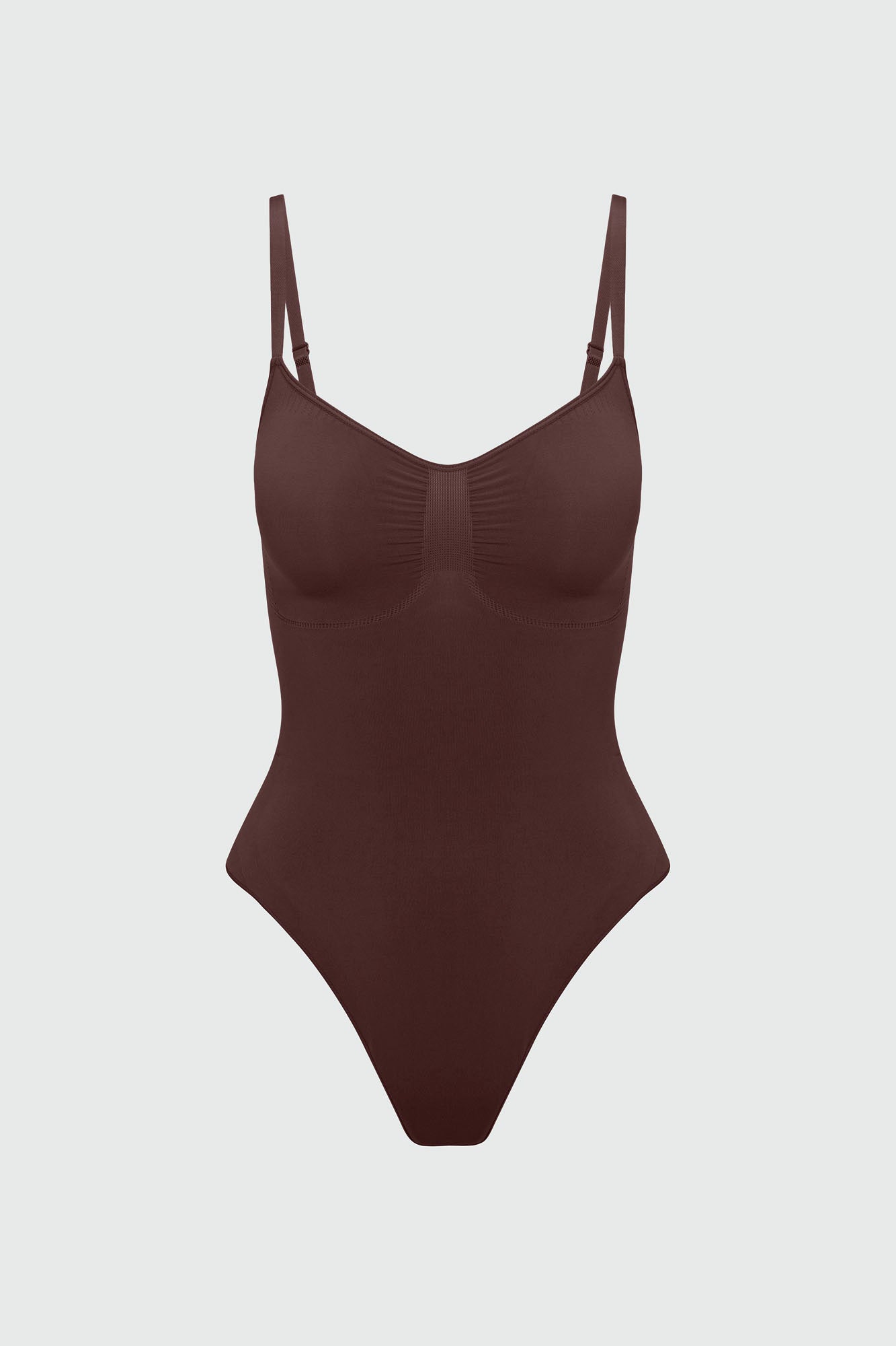 Brown bodyshaper on a light gray background