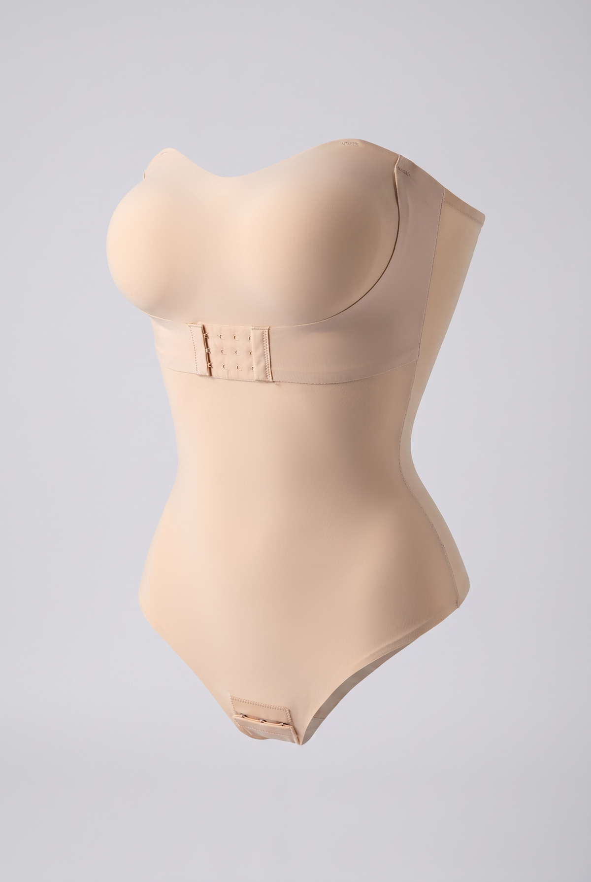 Beige shapewear bodysuit on a light gray background