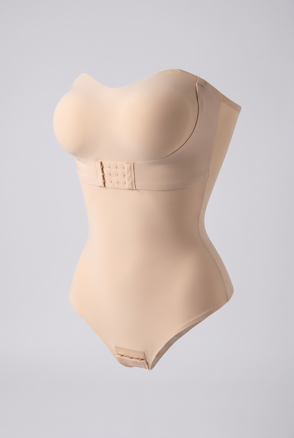 Beige shapewear bodysuit on a light gray background
